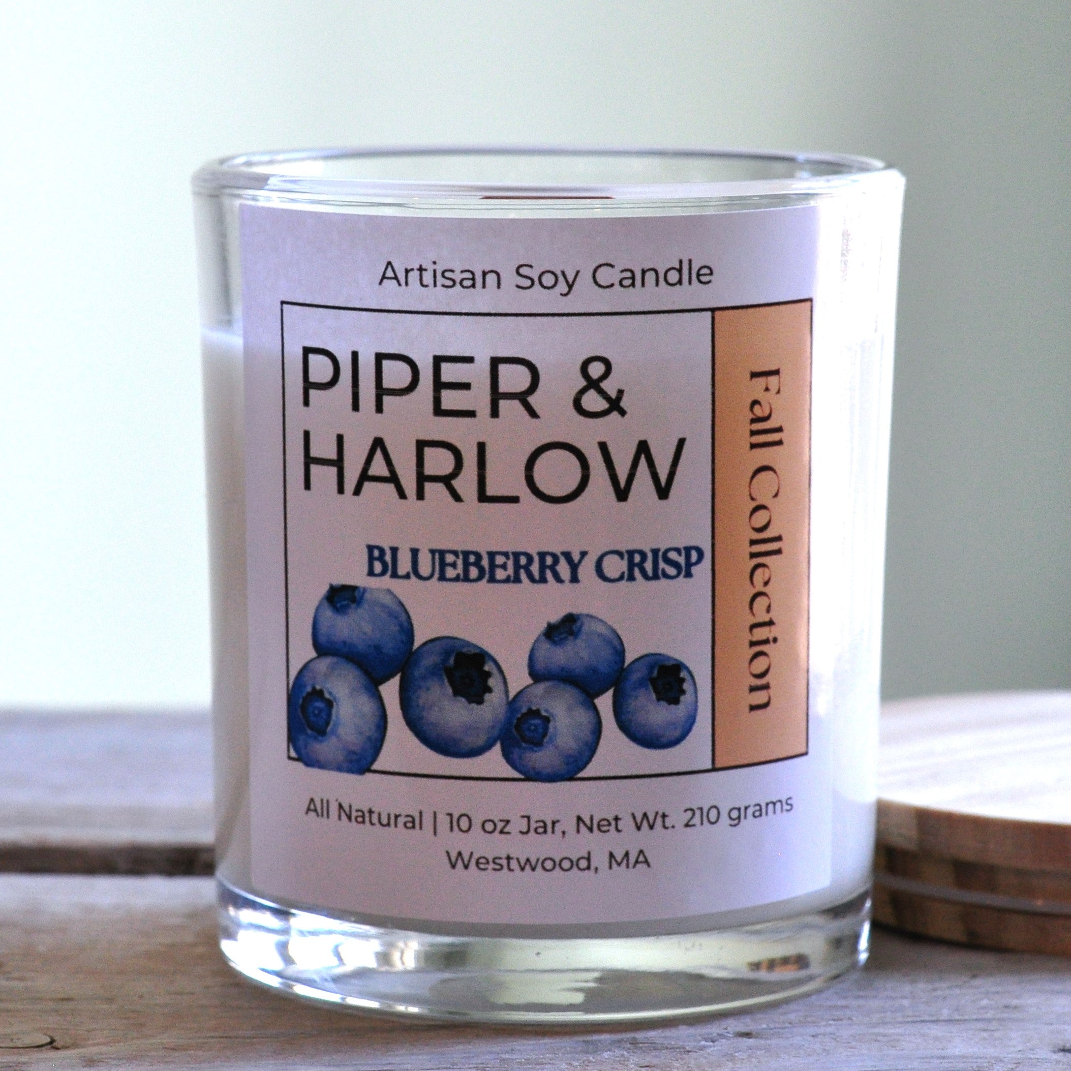 Blueberry Crisp soy candle with wood wick in clear glass jar. 10 oz.