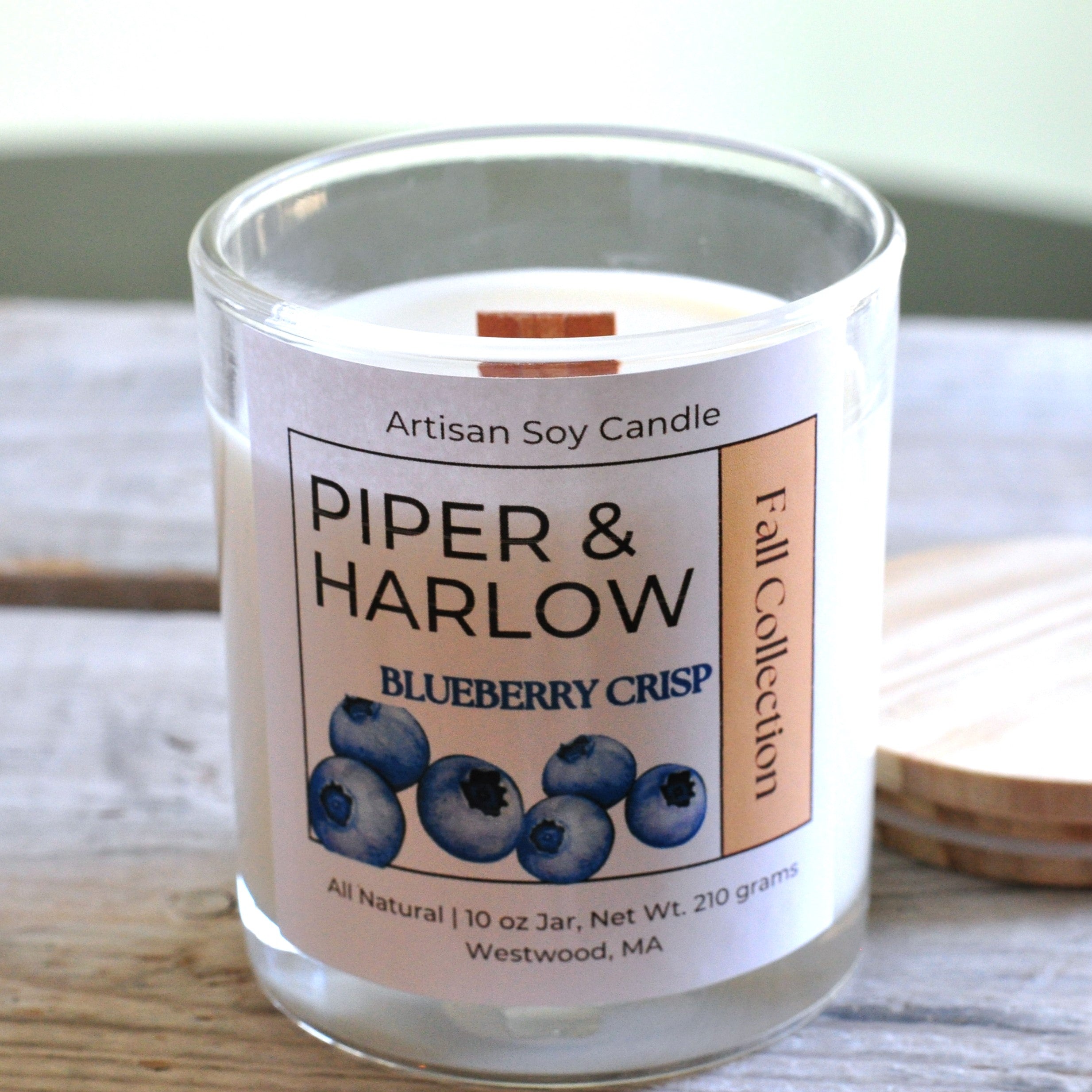 Blueberry Crisp soy candle with wood wick in clear glass jar. 10 oz.