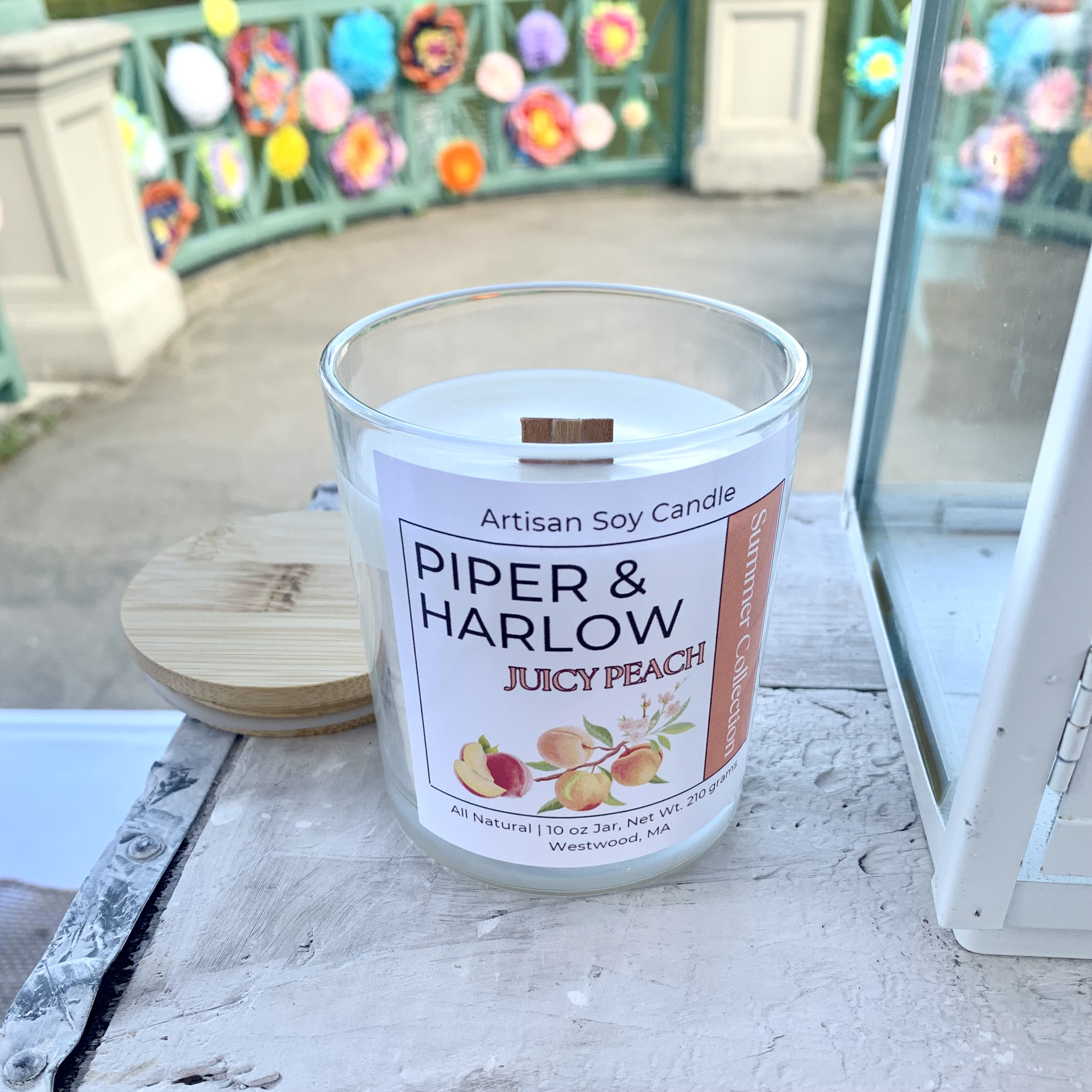 Juicy Peach scented soy candle in glass jar with crackling wood wick