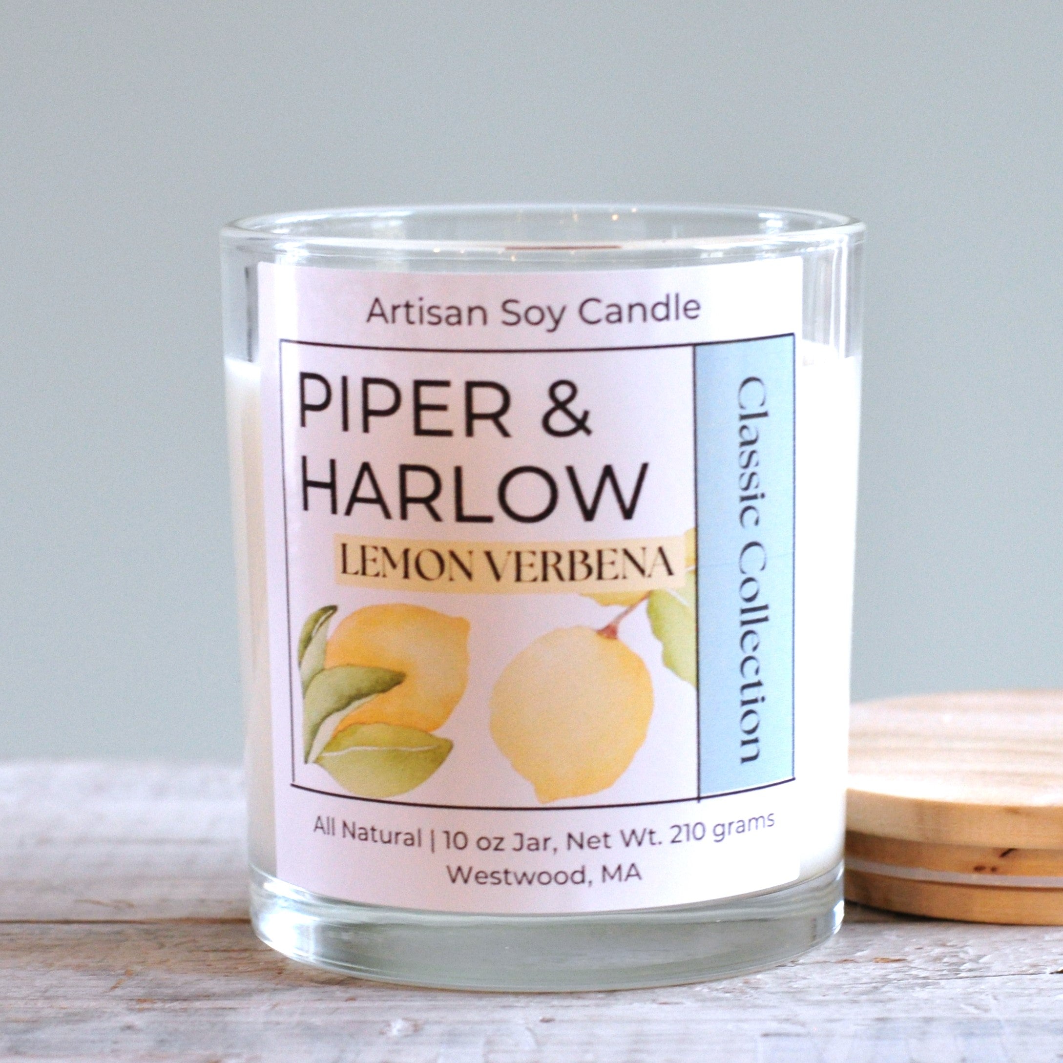 Lemon Verbena scented soy candle in glass jar with wood lid