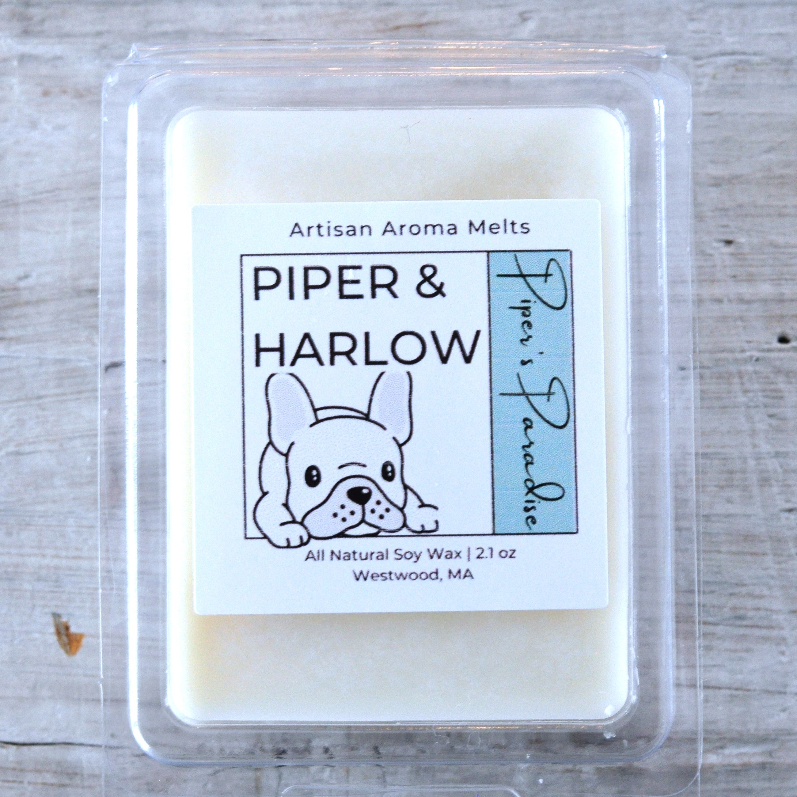 Piper & Harlow aroma melts in scent Piper's Paradis. There is a french bulldog on the label.