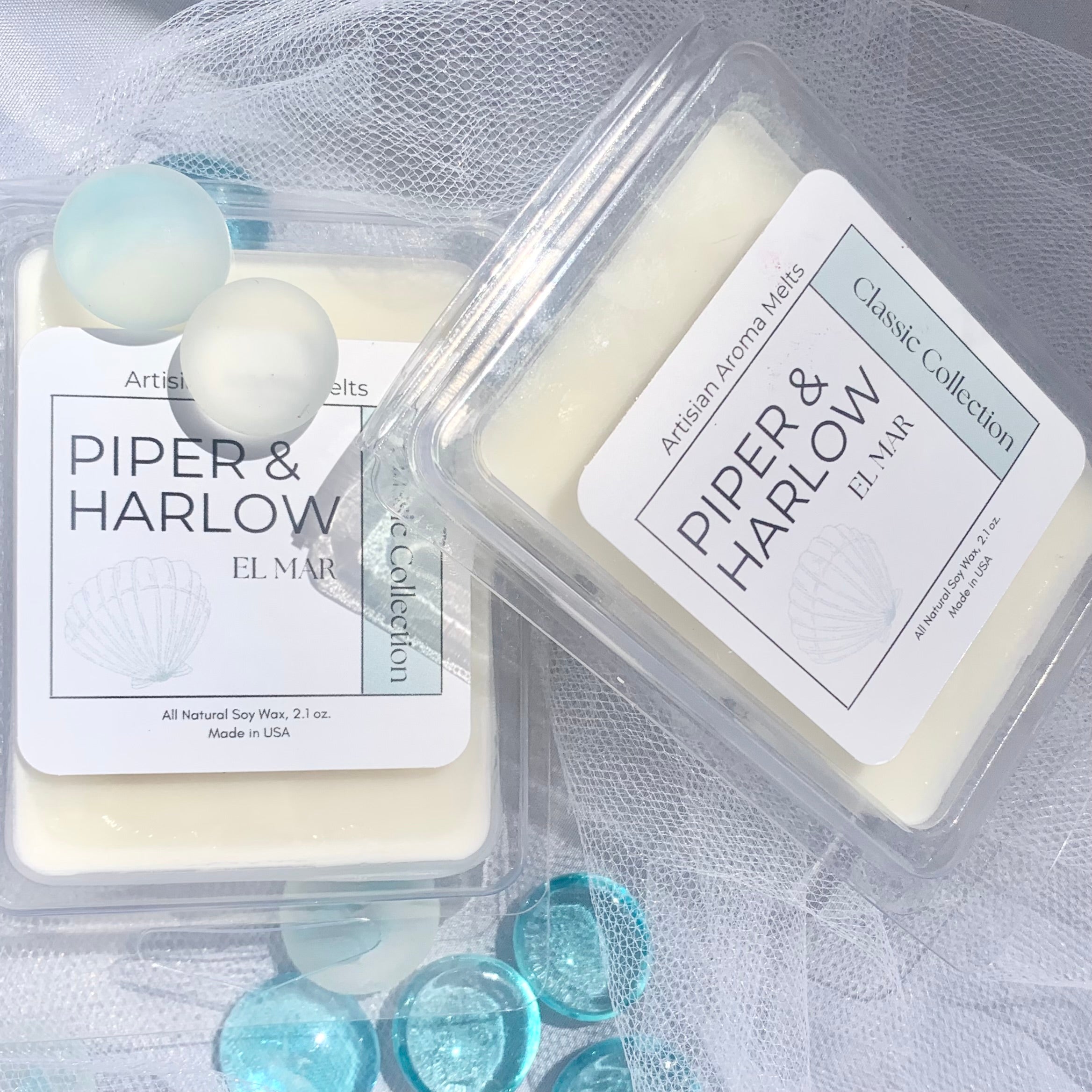 Two packages of El Mar wax melts with decorative glass beads.